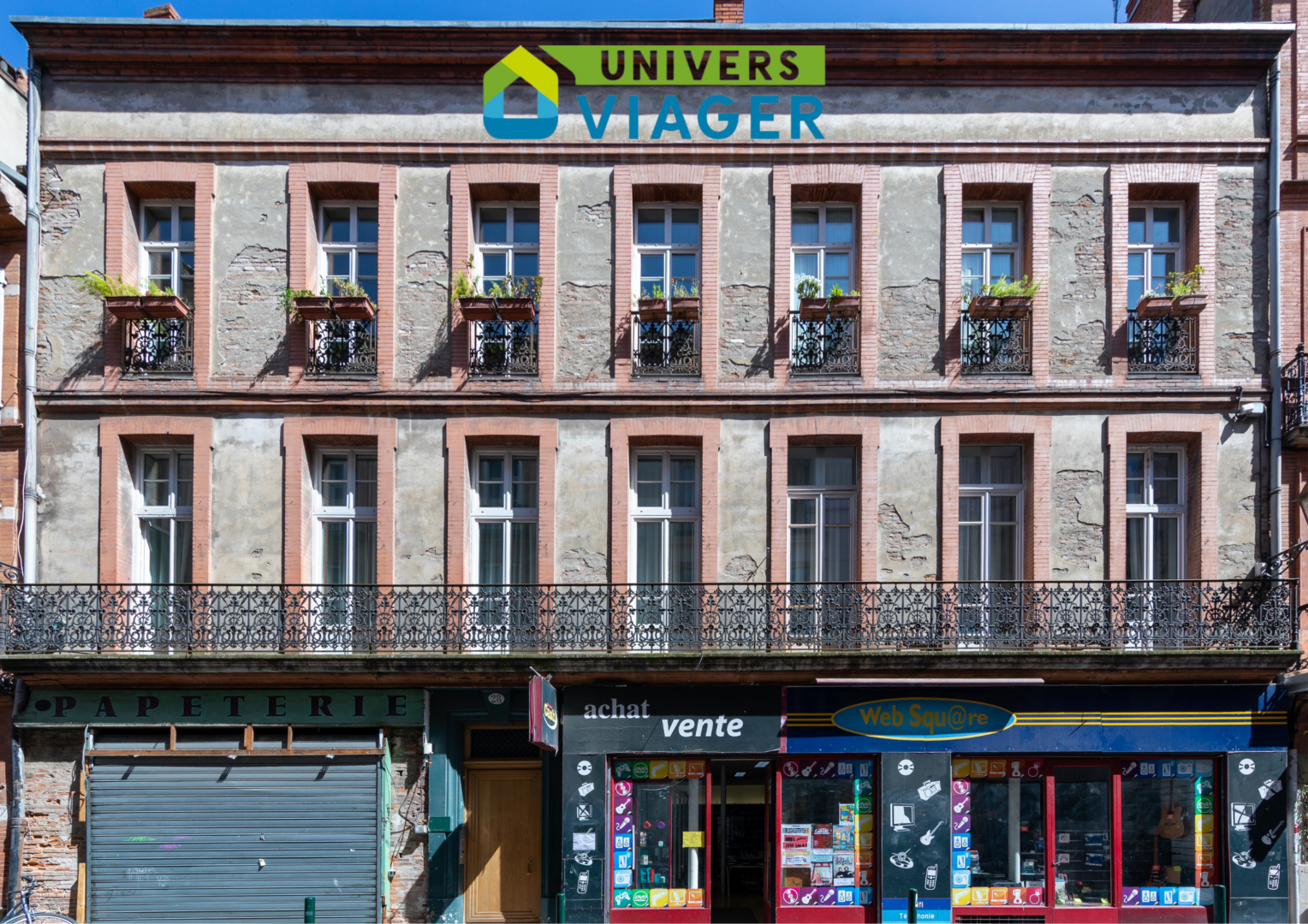 Toulouse-viager-occupe-porte vue balcon appartement standing brique